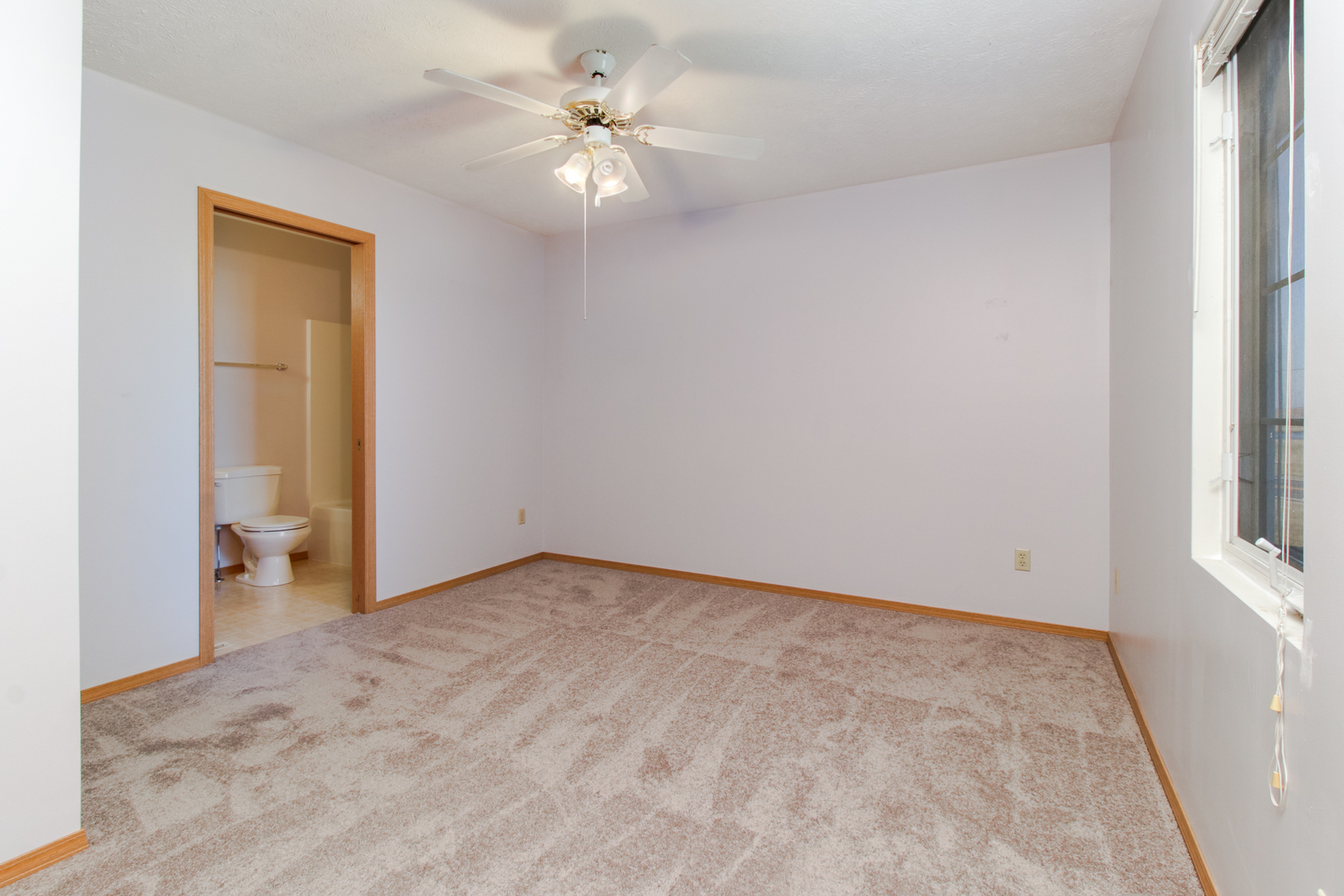 2 Andy Court, Unit 3 Bloomington, IL 61704 - Photo 8 of 13 an empty room with a bathroom