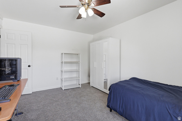 1652 West 800 South Lehi, UT 84043 - Photo 18 of 27 Carpeted bedroom with a ceiling fan and a desk
