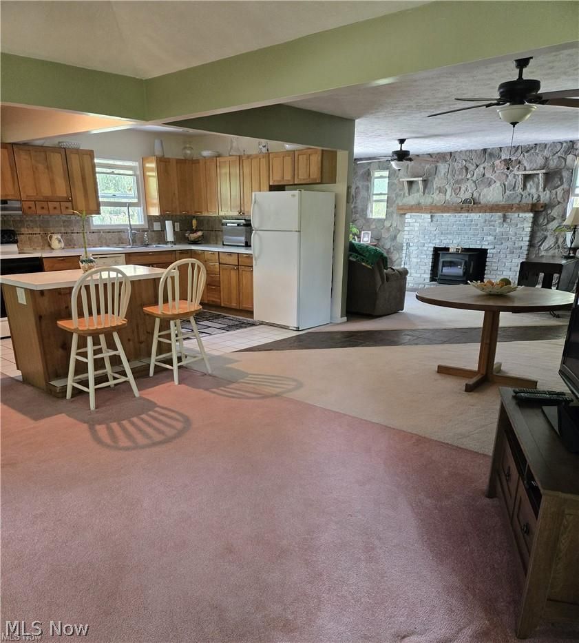 14640 Stone Road Newbury, OH 44065 - Photo 9 of 19 The true great room surrounds the kitchen