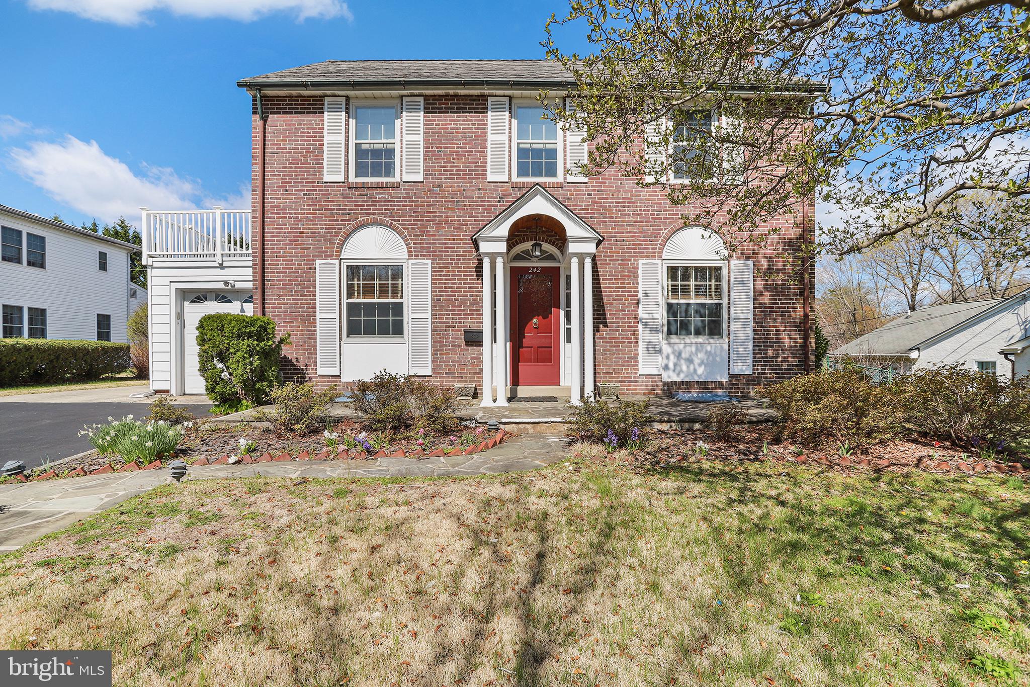 242 North Rolling Road Springfield, PA 19064 - Photo 1 of 37 a front view of a house with a yard
