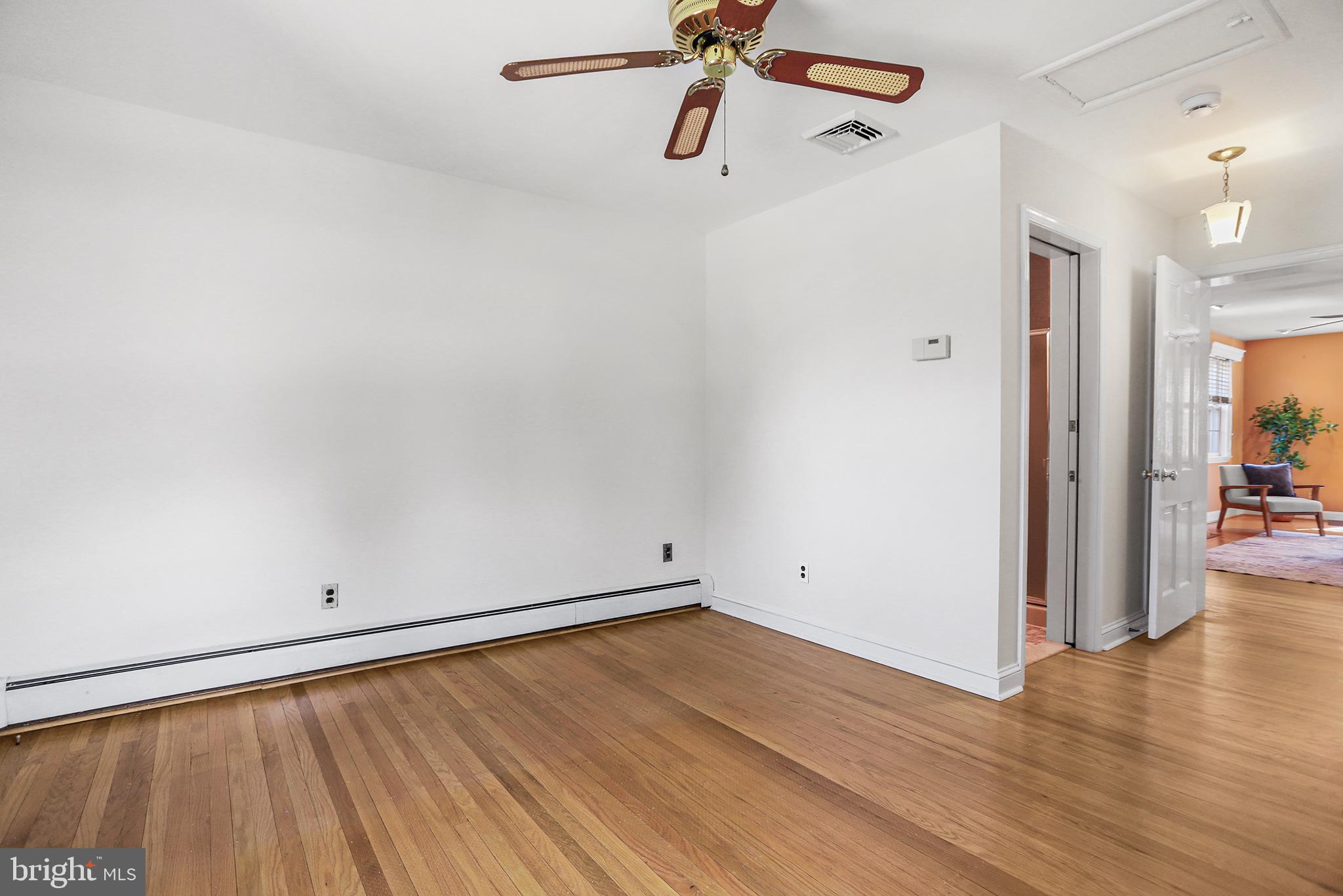 242 North Rolling Road Springfield, PA 19064 - Photo 26 of 37 a view of a room with wooden floor