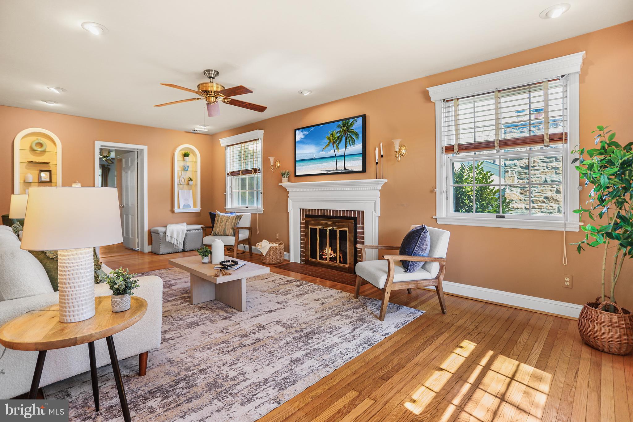 242 North Rolling Road Springfield, PA 19064 - Photo 6 of 37 a living room with furniture fireplace and window