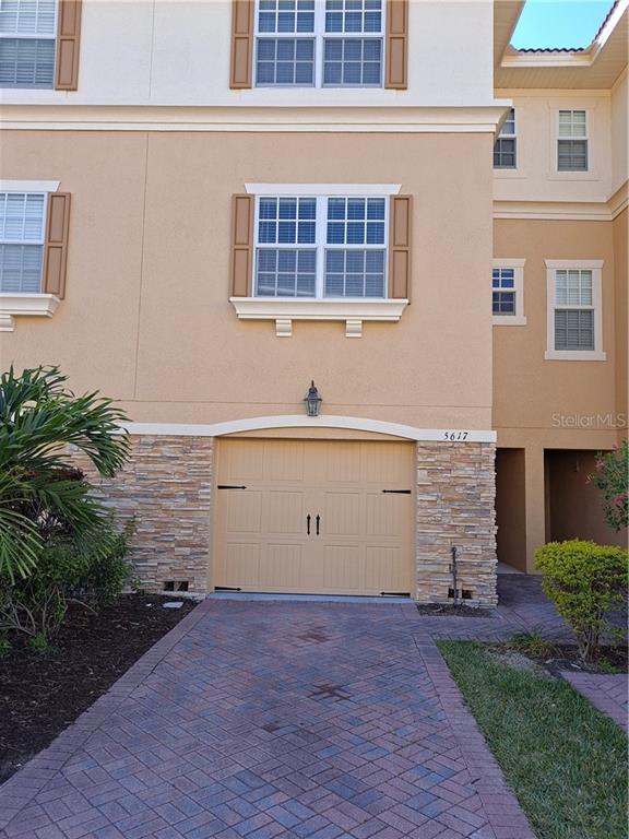 5617 Sea Turtle Court New Port Richey, FL 34652 - Photo 1 of 1 FRONT OF TOWNHOUSE FACING EAST