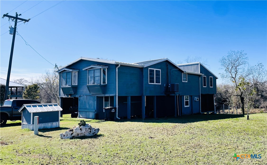 40 Cypress Valley Road Cuero, TX 77954 - Photo 1 of 19 a house view with a outdoor space
