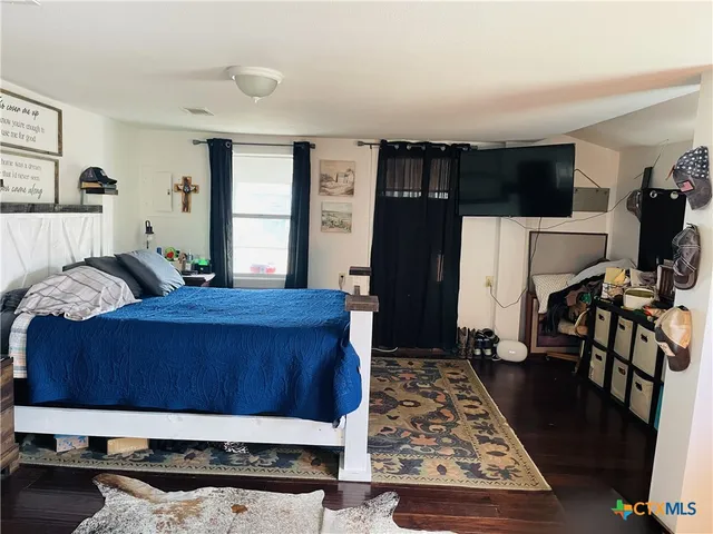 a view of storage and utility room with washer and dryer