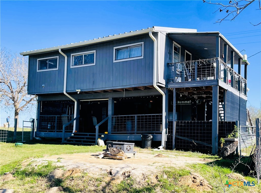 40 Cypress Valley Road Cuero, TX 77954 - Photo 16 of 24 a view of house with yard and covered with snow