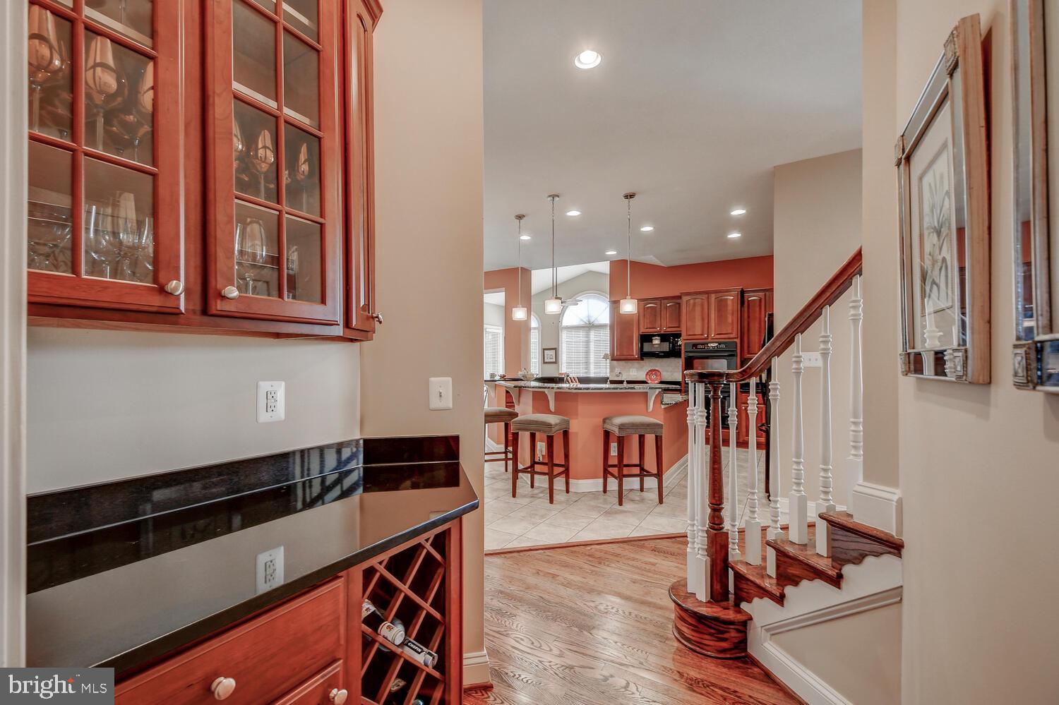 829 Stable Manor Road Reisterstown, MD 21136 - Photo 11 of 53 BUTLER PANTRY WITH DISPLAY CABINETS & WINE RACK