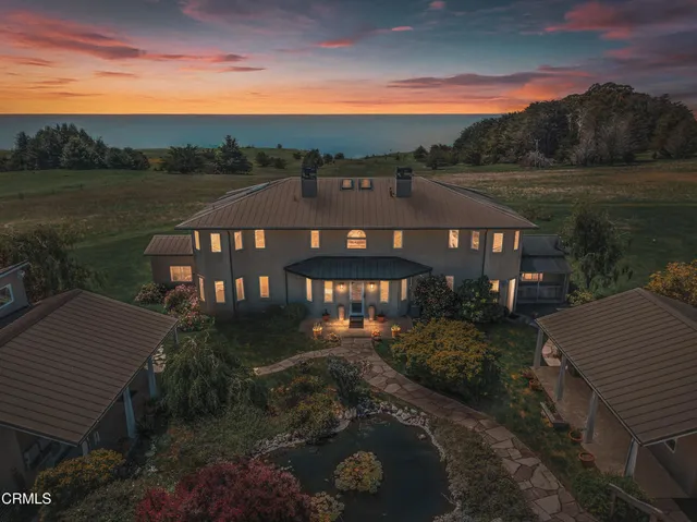 a view of a lake with a garden