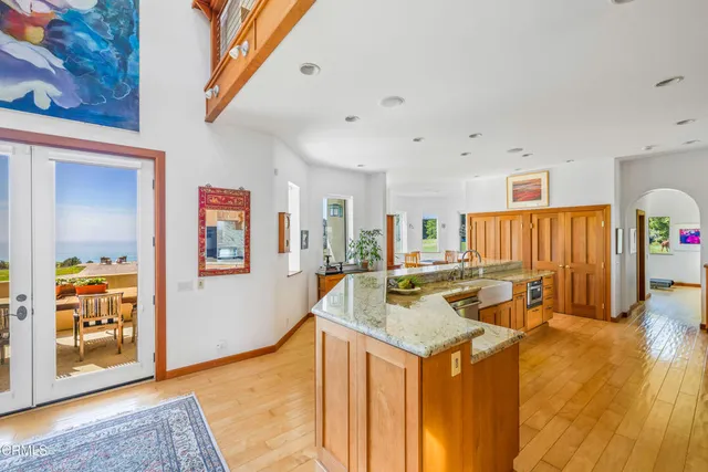 a living room with fireplace furniture and a flat screen tv