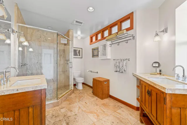 front view of a house with a large window