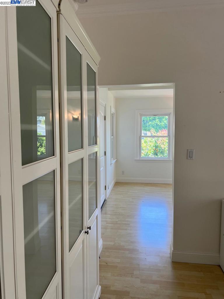209 McLeod Street Livermore, CA 94550 - Photo 15 of 26 an empty room with wooden floor and a window