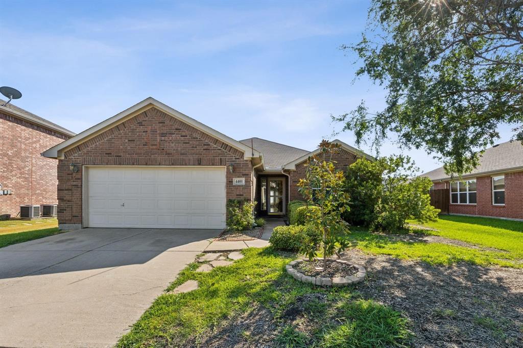 4401 Sycamore Road Melissa, TX 75454 - Photo 1 of 22 a front view of a house with a garden and yard