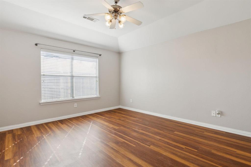 4401 Sycamore Road Melissa, TX 75454 - Photo 13 of 22 wooden floor in an empty room with a window