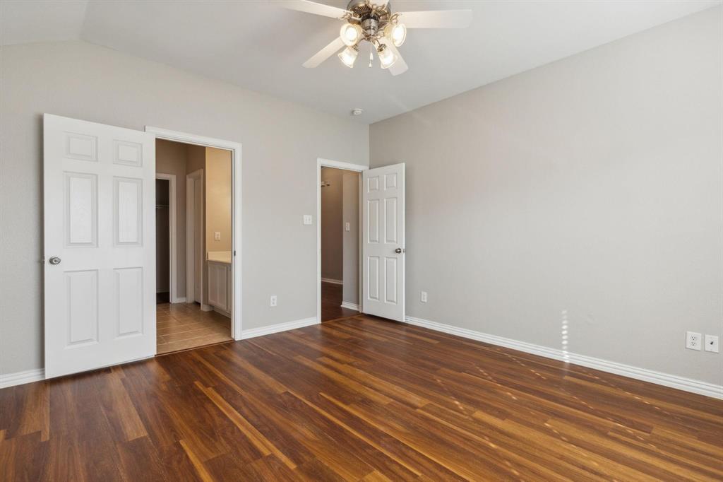 4401 Sycamore Road Melissa, TX 75454 - Photo 14 of 22 wooden floor in an empty room with a window