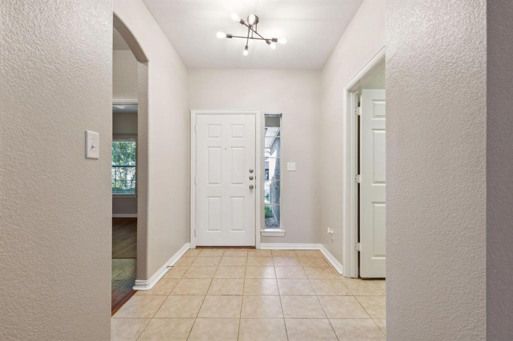 4401 Sycamore Road Melissa, TX 75454 - Photo 2 of 22 an empty room with entrance and door