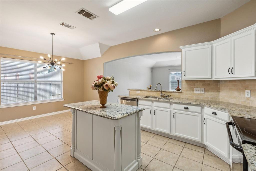4401 Sycamore Road Melissa, TX 75454 - Photo 6 of 22 a kitchen that has a sink and cabinets