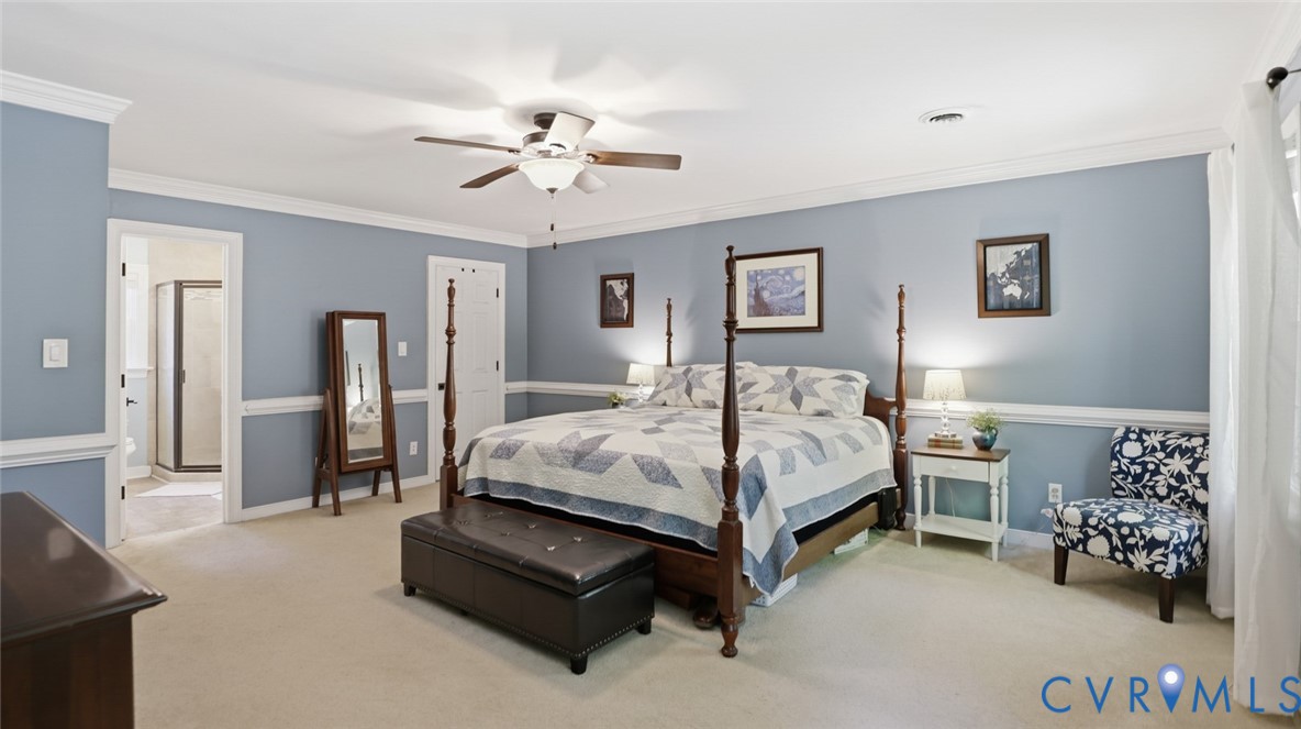 10716 Chalkley Road Richmond, VA 23237 - Photo 27 of 46 a bedroom with a bed and furniture
