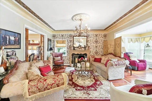 a kitchen with stainless steel appliances a stove a sink and a refrigerator