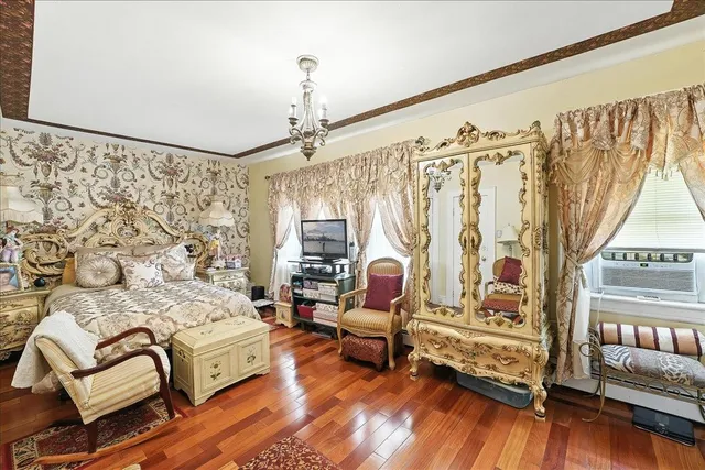 a bedroom with bed and a couch