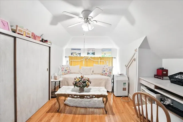 a bathroom with a sink vanity mirror and toilet