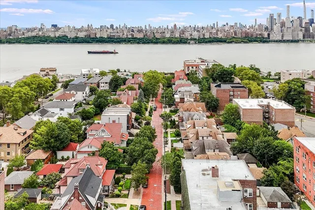 a view of a city and lake