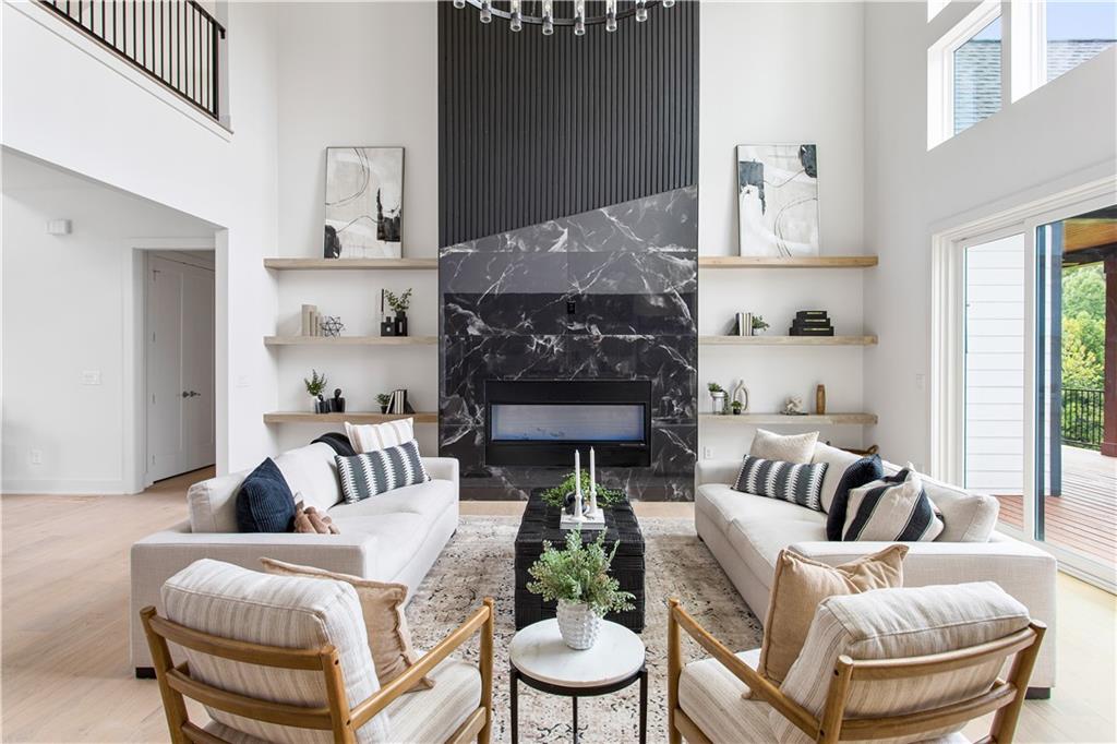 3300 Jack Glass Road Monroe, GA 30656 - Photo 12 of 54 a living room with furniture and a fireplace