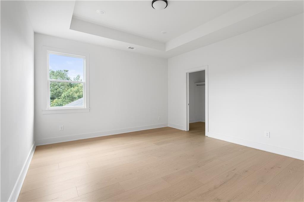 3300 Jack Glass Road Monroe, GA 30656 - Photo 22 of 54 an empty room with windows