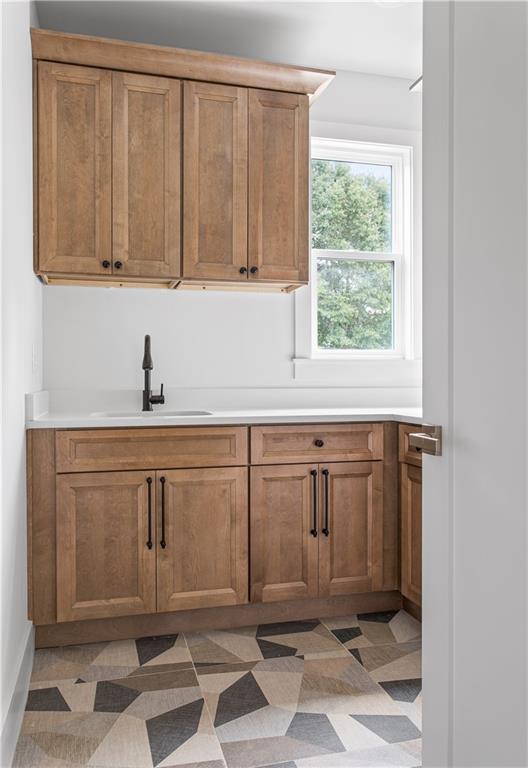 3300 Jack Glass Road Monroe, GA 30656 - Photo 24 of 54 a view of a sink and cabinets