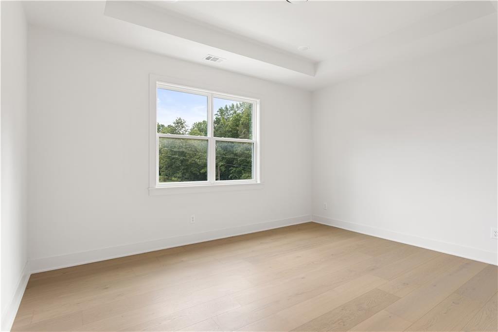 3300 Jack Glass Road Monroe, GA 30656 - Photo 28 of 54 an empty room with a window