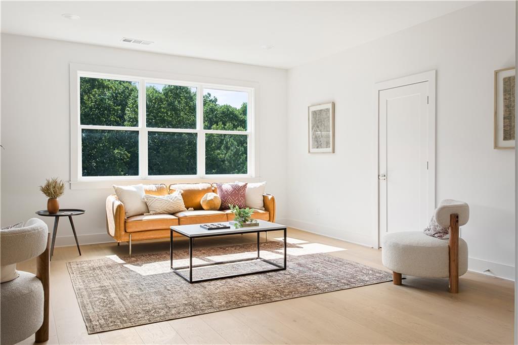 3300 Jack Glass Road Monroe, GA 30656 - Photo 29 of 54 a living room with furniture and a window
