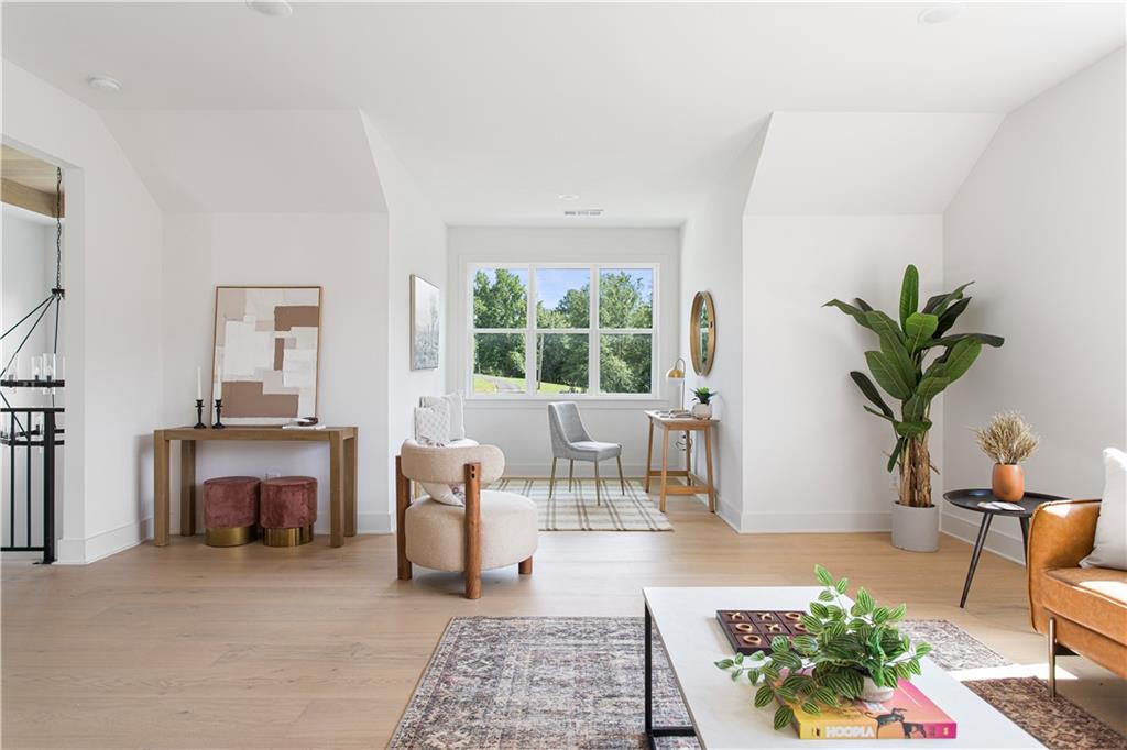 3300 Jack Glass Road Monroe, GA 30656 - Photo 30 of 54 a living room with furniture a window and a potted plant