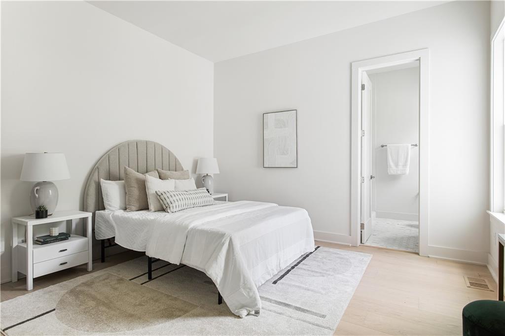 3300 Jack Glass Road Monroe, GA 30656 - Photo 35 of 54 a bedroom with a bed and a couch