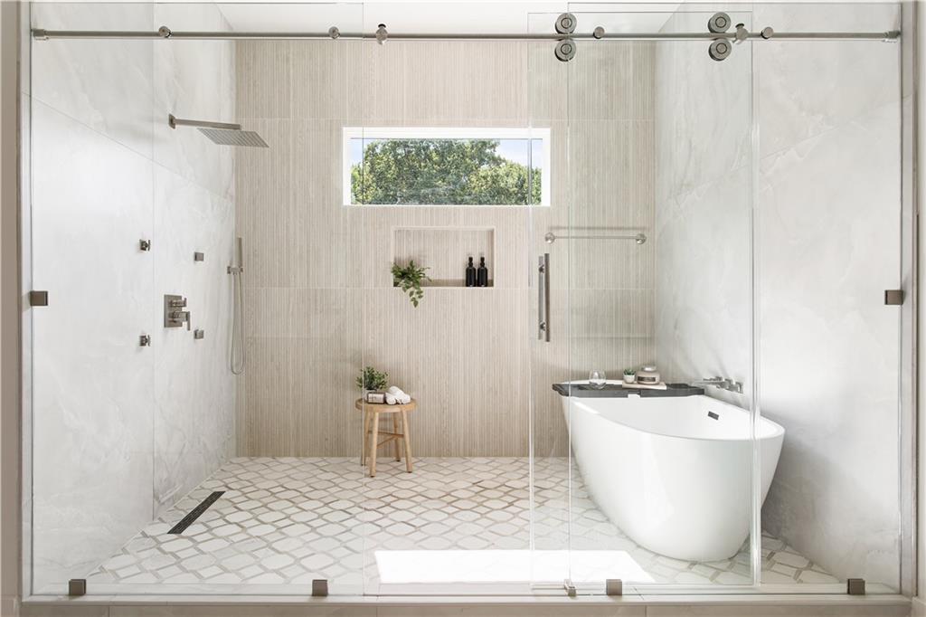 3300 Jack Glass Road Monroe, GA 30656 - Photo 38 of 54 a bathroom with a bathtub and shower