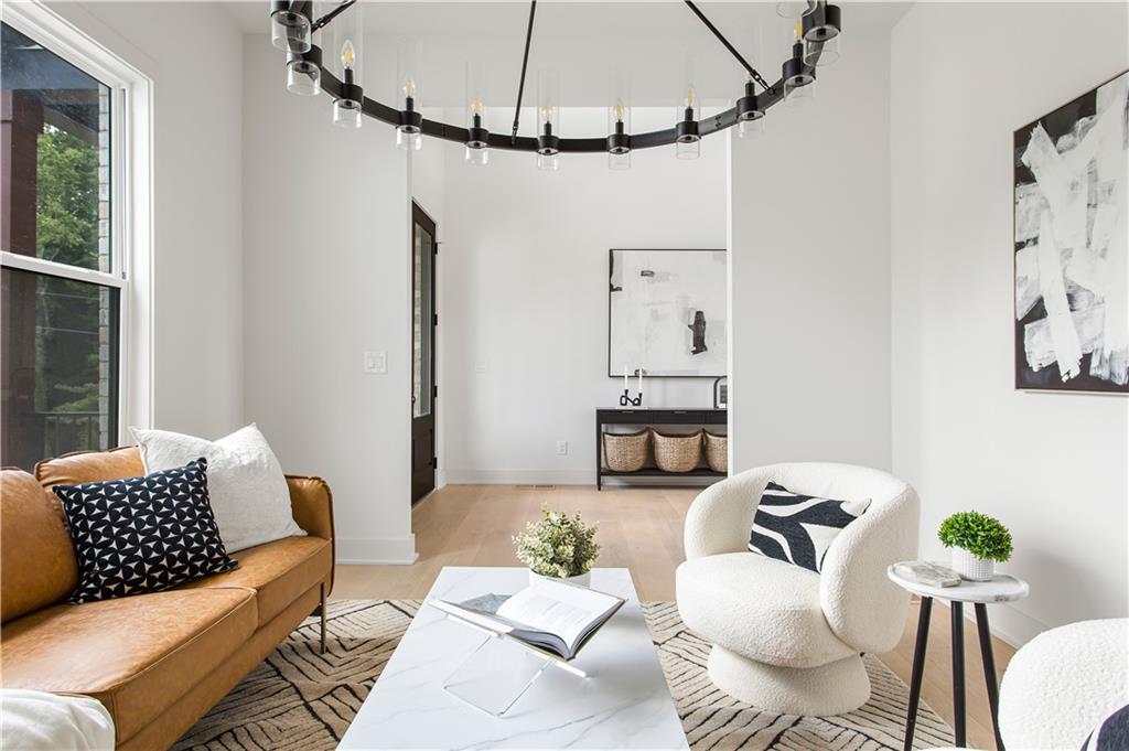 3300 Jack Glass Road Monroe, GA 30656 - Photo 8 of 54 a living room with furniture and a fireplace