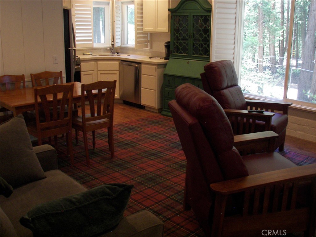 1101 Big Tree Lane Crestline, CA 92325 - Photo 15 of 30 a living room with furniture and large windows