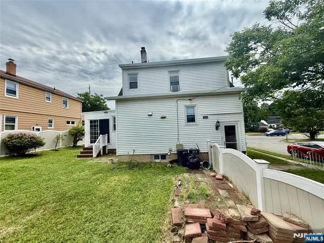 a view of a back yard of the house