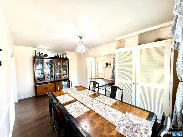a view of a dining room with furniture and window