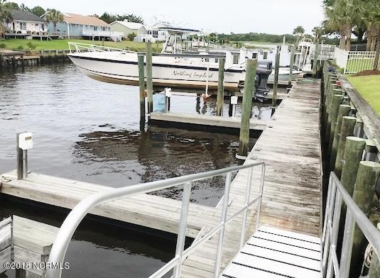 209 Inlet Point Drive Wilmington, NC 28409 - Photo 2 of 50 35 foot boat slip & golf cart parking area