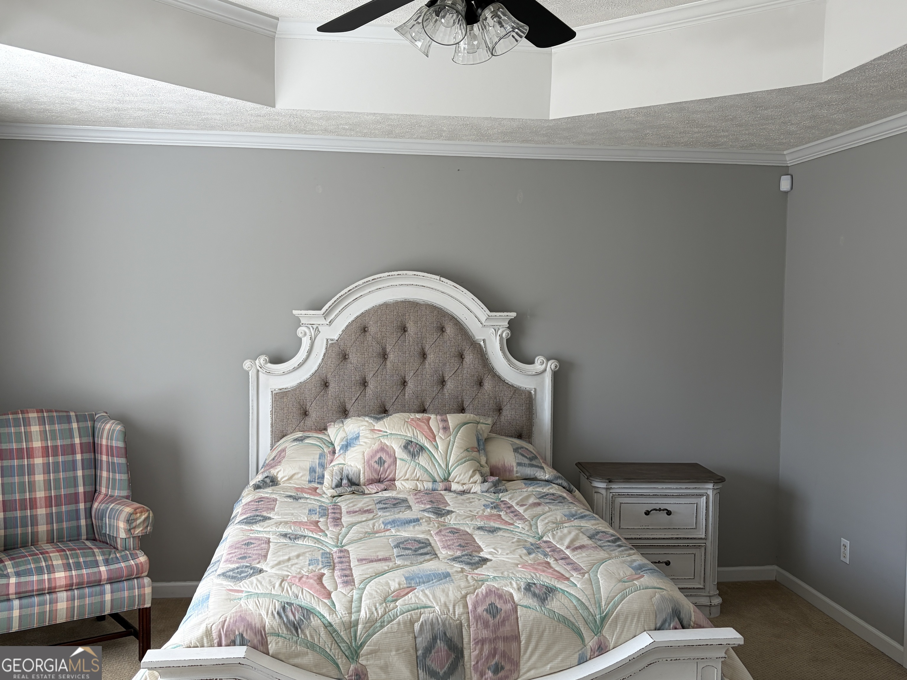 3603 Garden Lakes Parkway Rome, GA 30165 - Photo 12 of 22 a bed with a white comforter and pillows