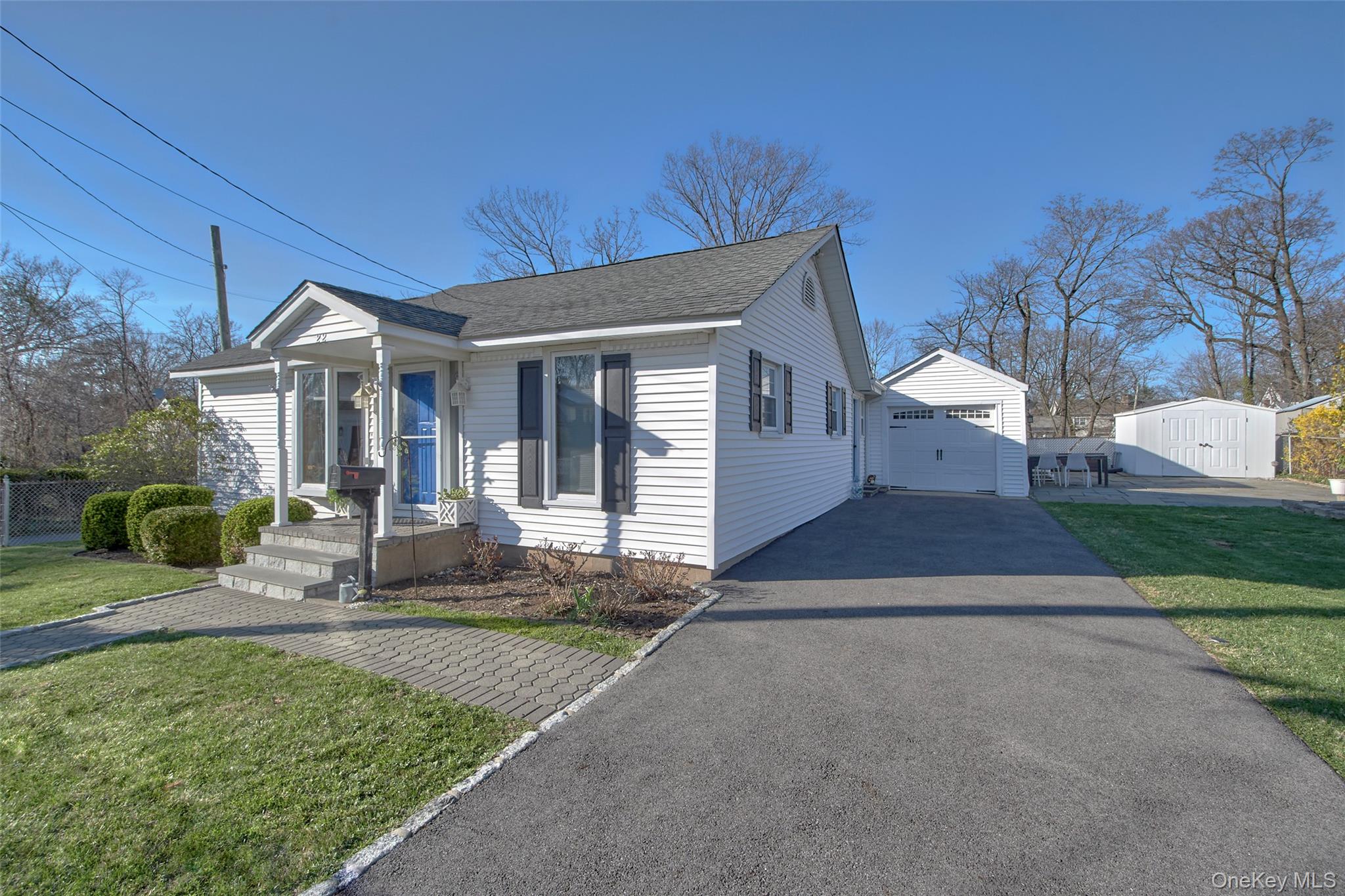 Charming one-level house. Driveway is deep enough to park two cars.