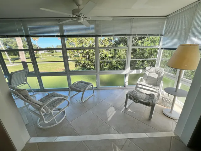 a living room with large window