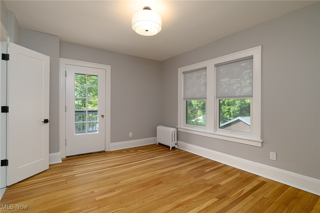 2624 Lee Road Cleveland, OH 44118 - Photo 23 of 50 Unfurnished bedroom #1 with access to Jack and Jill full bathroom, door to balcony and large windows
