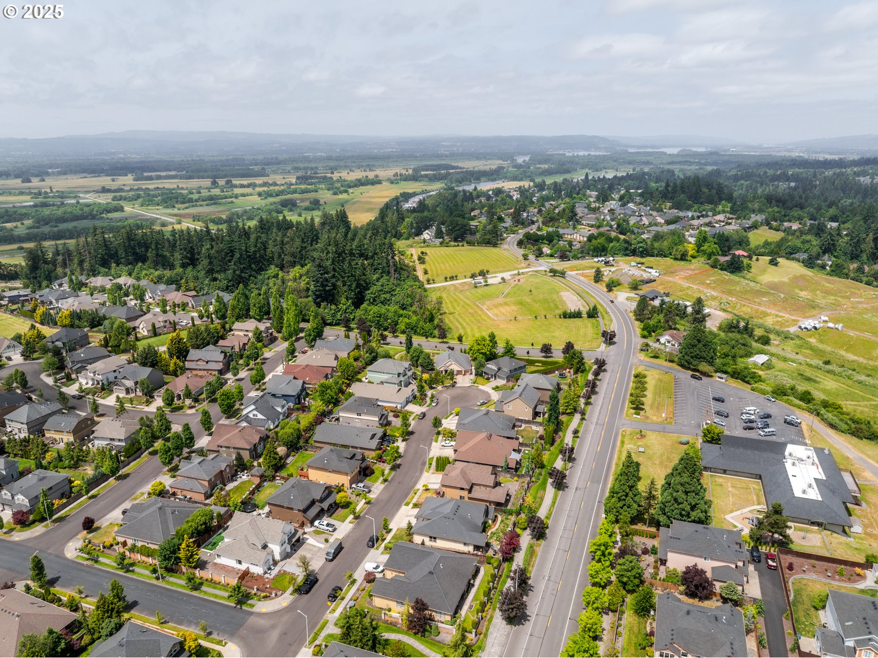 1401 South Dusky Drive Ridgefield, WA 98642 - Photo 44 of 46 an aerial view of residential building and lake