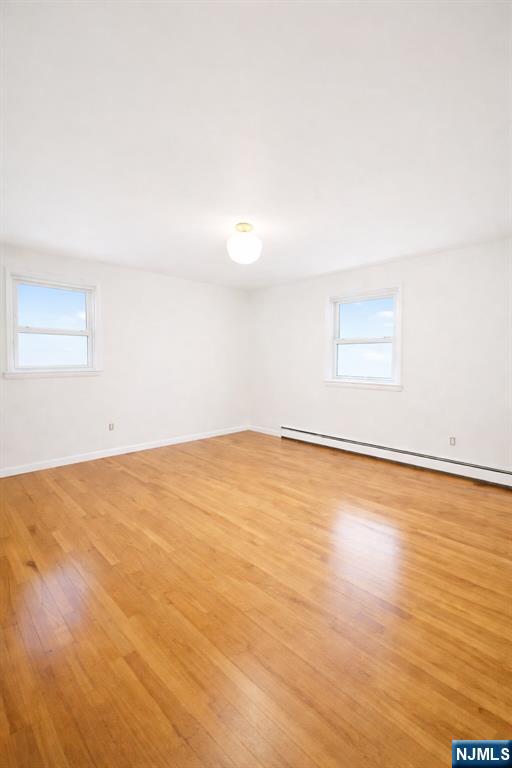 2755 Morris Avenue, Unit 2 Union, NJ 07083 - Photo 4 of 8 an empty room with a empty space and window