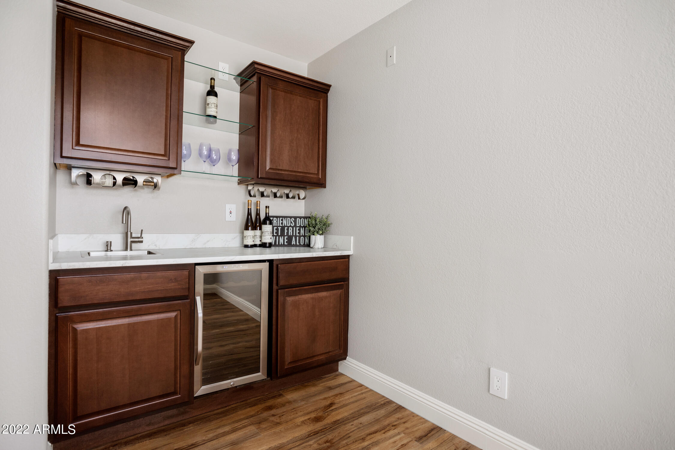14938 Piccadilly Road Goodyear, AZ 85395 - Photo 8 of 45 Wet bar in den for fun entertaining