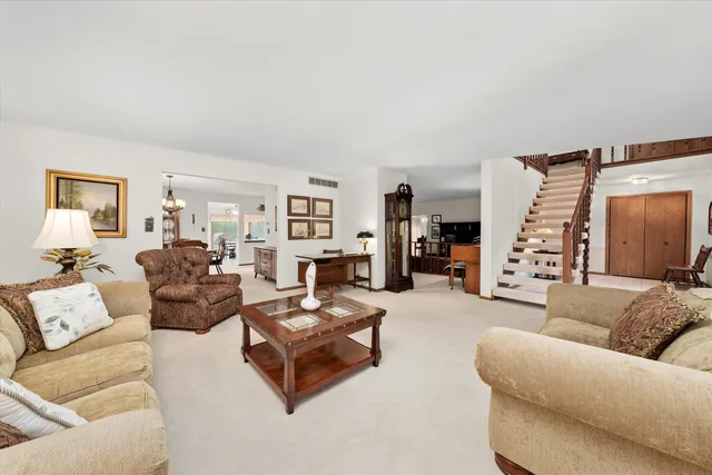a view of a dining room with furniture window and outside view