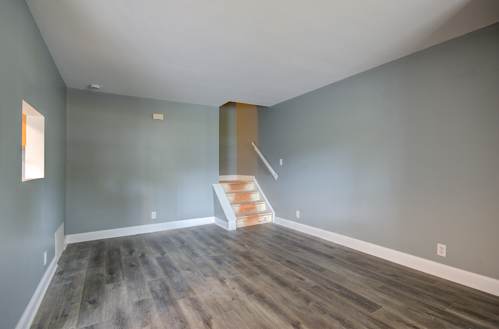 2302 Carnation Drive, Unit 317C Crest Hill, IL 60403 - Photo 2 of 17 a view of an empty room with wooden floor