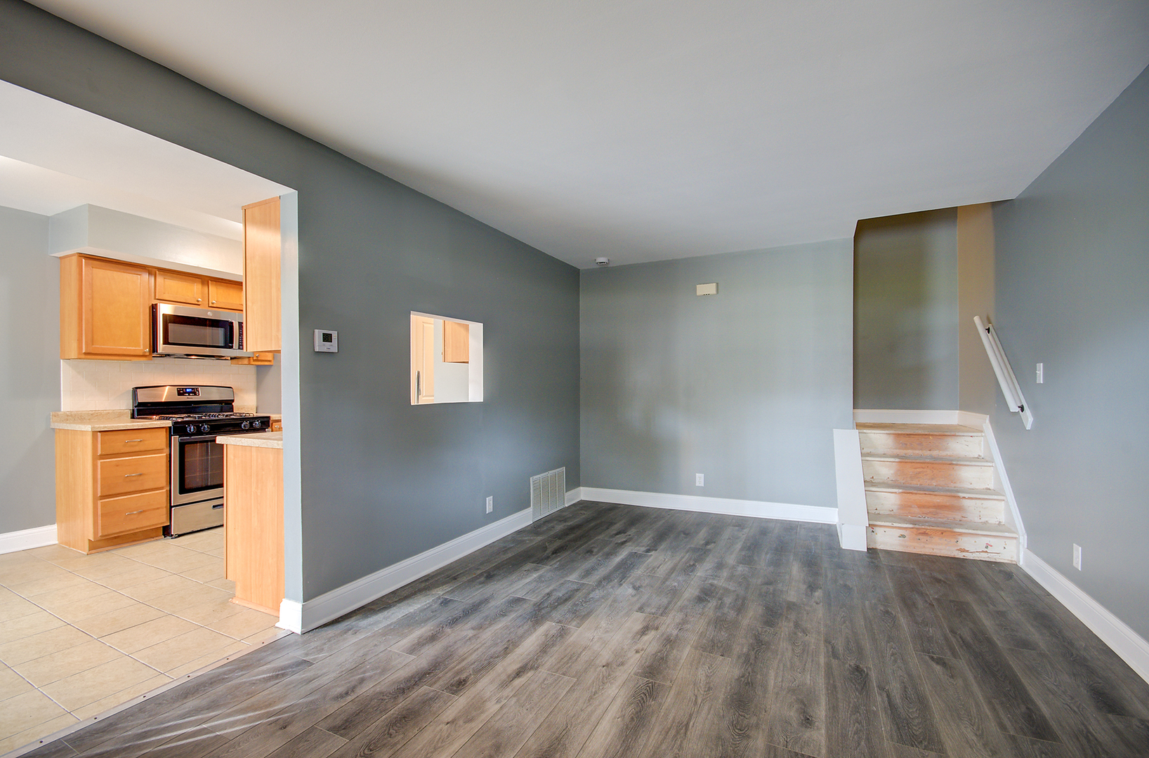 2302 Carnation Drive, Unit 317C Crest Hill, IL 60403 - Photo 3 of 17 a view of kitchen with furniture and wooden floor