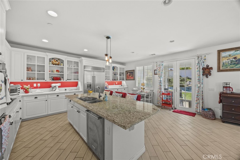 23129 Rustic Oak Drive Wildomar, CA 92595 - Photo 8 of 42 Large island perfect for gathering