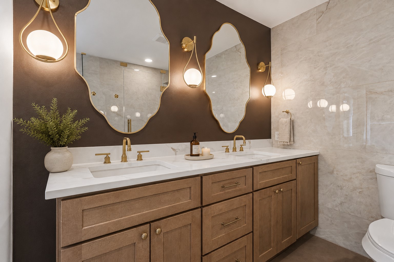 11809 Charing Cross Road Austin, TX 78759 - Photo 14 of 34 Double vanity with elegant brass fixtures and stylish wall-mounted mirrors creates a lavish primary bath.